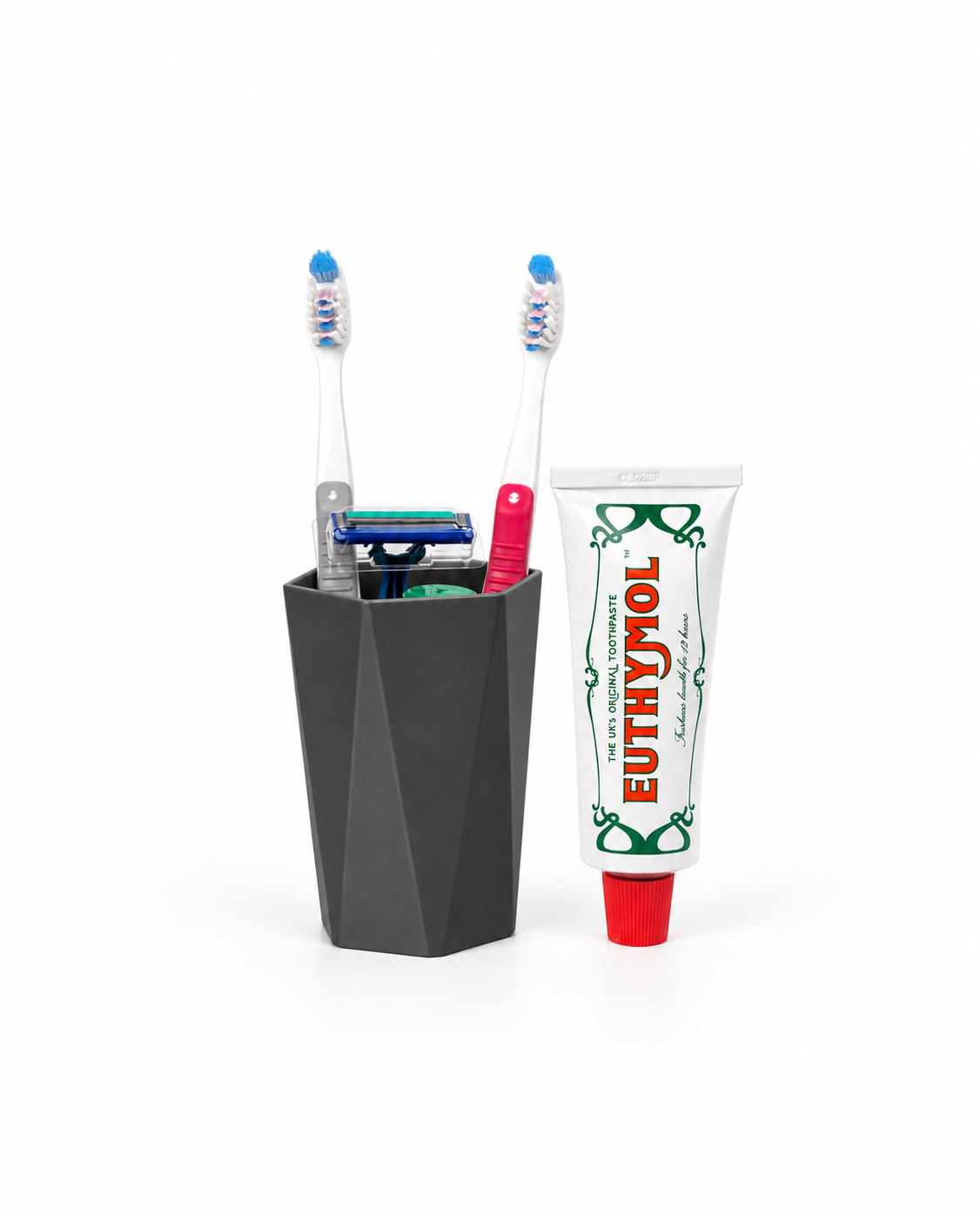 Black geometric bathroom tumbler for toothbrushes and oral care essentials